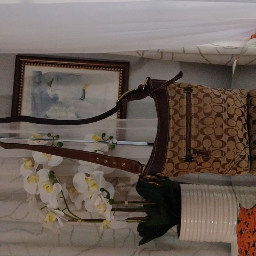 Authentic Coach signature Jacquard medium duffle crossbody shoulder bag.